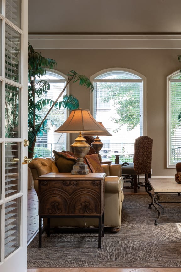 a living room with open doors