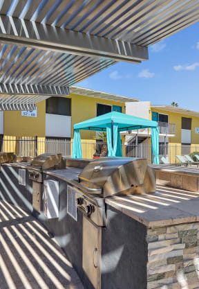 our apartments have a large patio with a grill and a pool