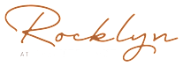 A logo with the word "Rocklyn" written in cursive.