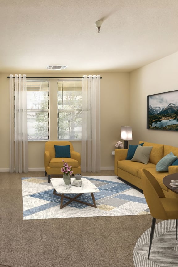 a living room with white couches and a coffee table at Hilltop Commons Senior Living, Grass Valley, CA