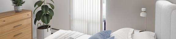 Bedroom with large bed and window
