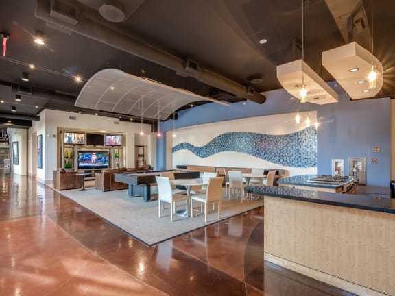 a kitchen with stainless steel appliances and granite countertops