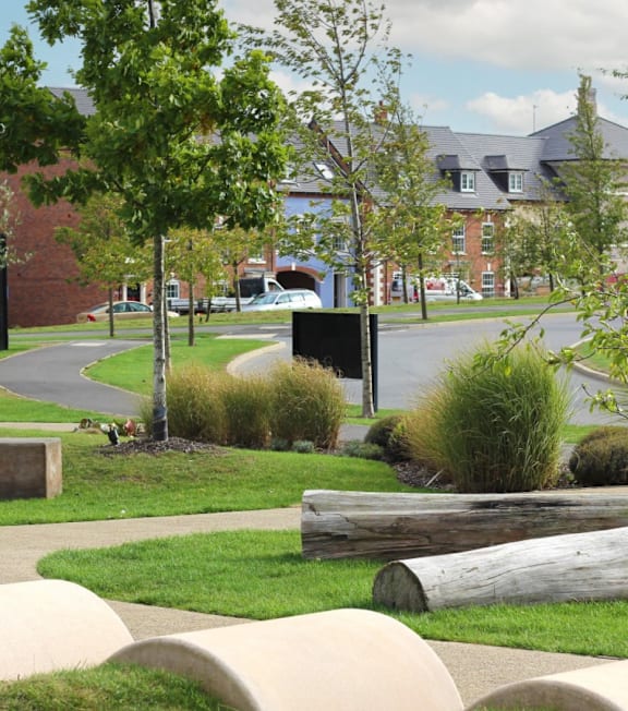 a wooden bench in front of a building