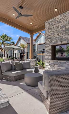 a lounge outdoor area with couches and chairs and tables at Canter, Ocala, FL, 34474
