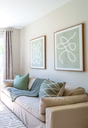 a living room with a couch and two chairs at Edgebrook Residences, Merrimack New Hampshire