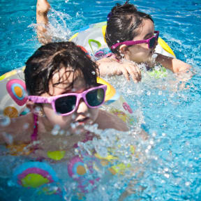 Kids swimming in pool
