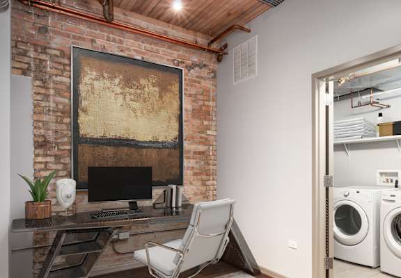 A den office and in unit laundry 