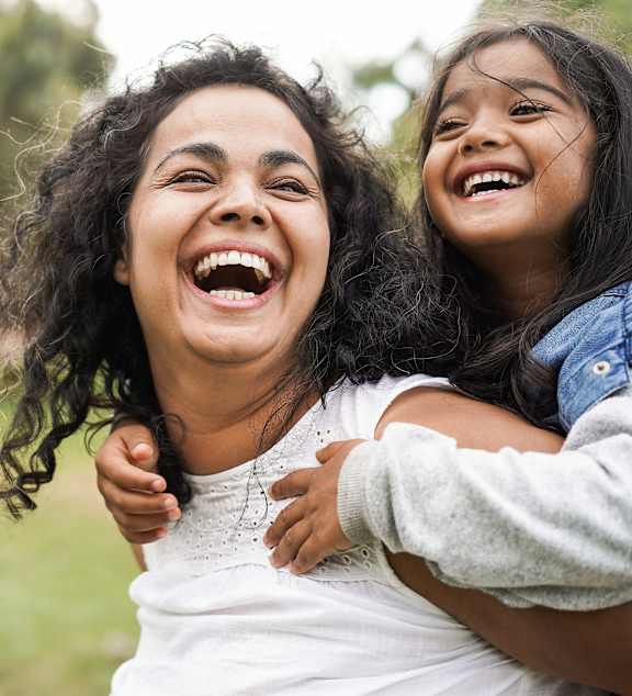 mother and daughter enjoying in park at The MK, Indiana