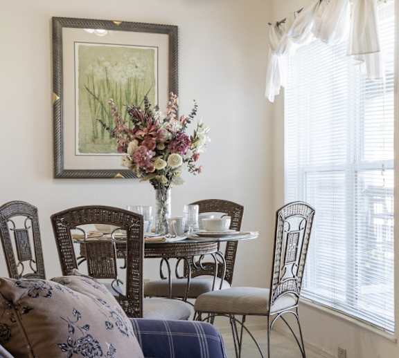 A breakfast dining table at Hawthorne Apartment Homes, set for a cozy and inviting meal.