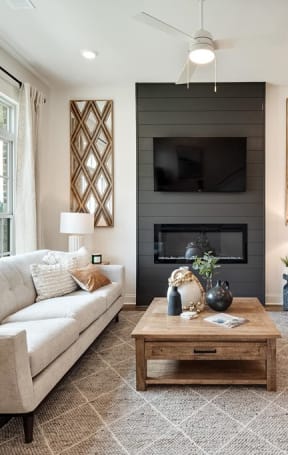 a living room with a couch and a table