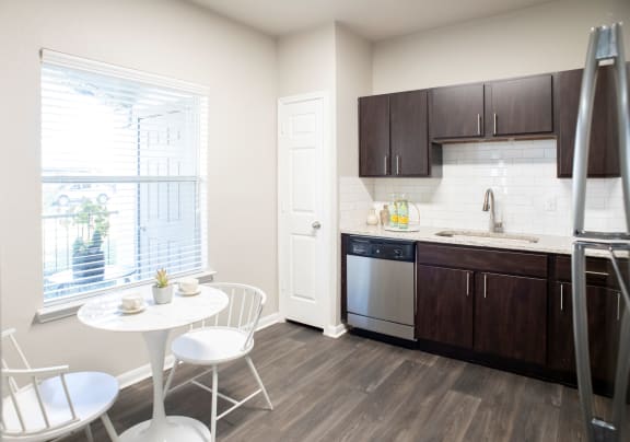 Eat-In Kitchen Table With Sink  located at Retreat at Steeplechase in Houston, TX 77065