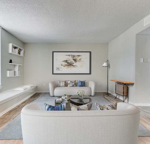 a living room with a ceiling fan and a large window at Hampton Gardens, Missouri, 63139