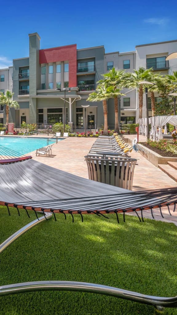 our apartments have a large pool and lounge chairs