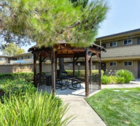 Outdoor Space with Gazebo, Grass and Tress  at Olympus Park Apartments, Roseville, California