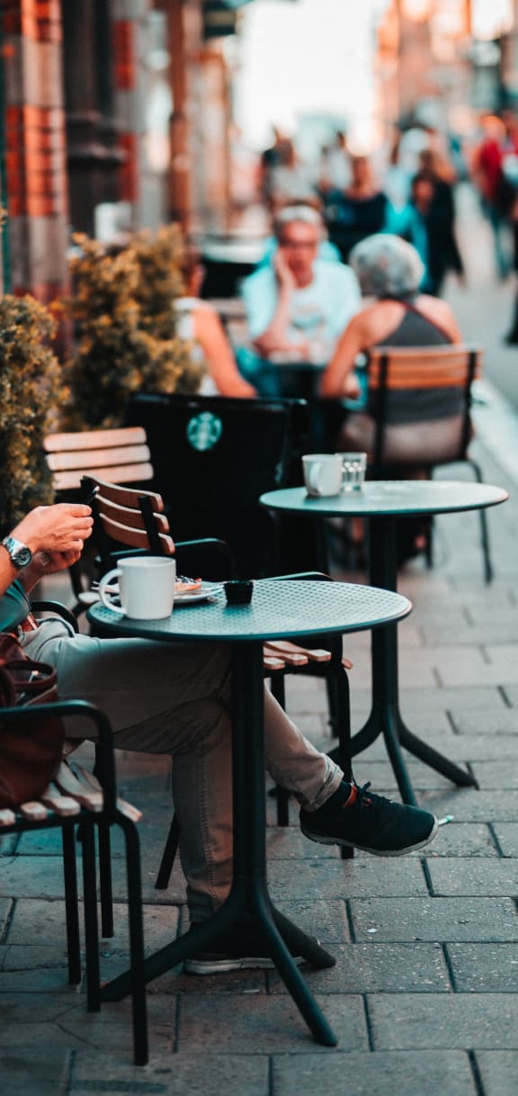 People dining at outdoor cafe