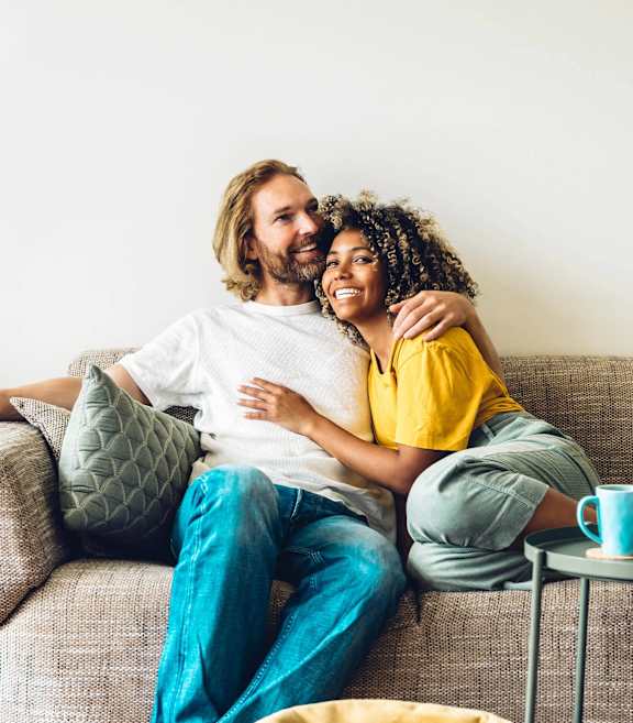 a man and a woman sitting on a couch