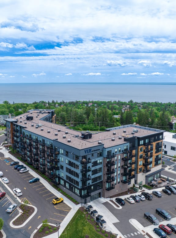 an aerial view of an apartment building overlooking the ocean at Vue at Bluestone, Duluth, Minnesota