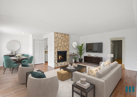 a living room with white walls, a large window, a leather couch and a glass coffee