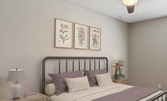 a bedroom with a bed and a ceiling fan at Acacia Gardens, Albuquerque, NM, 87111