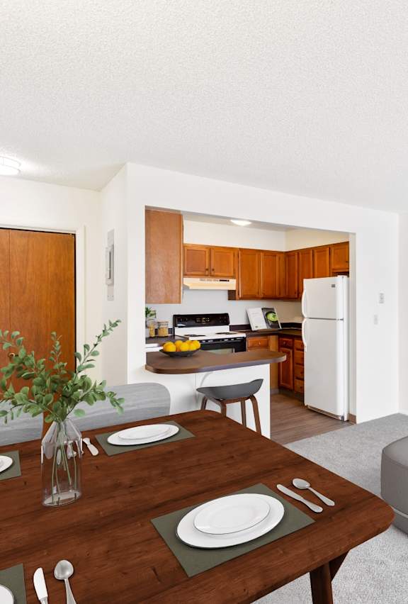 Kitchen with appliances at Rock Creek, Billings