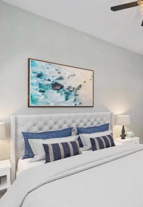 a bedroom with a bed and two windows at Bella Vista on Park, Florida, 33563