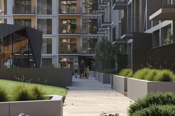 a rendering of a city street with trees and plants