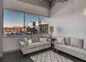 Thumbnail 12 of 41 - Trendy Living Room at The Tower Apartments, Tuscaloosa, Alabama