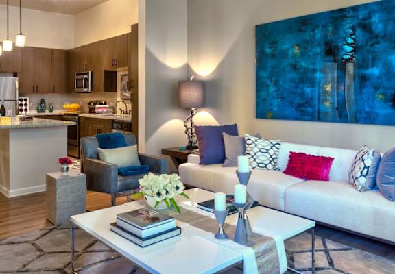 Living Room With Kitchen View at Berkshire Main Street, Durham, North Carolina