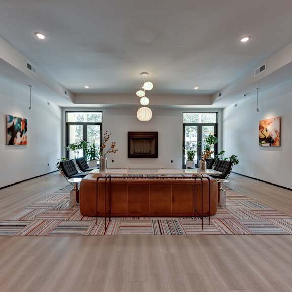 Room with sofa and chairs with carpet at Bridge at Saffron, Austin, TX 78717