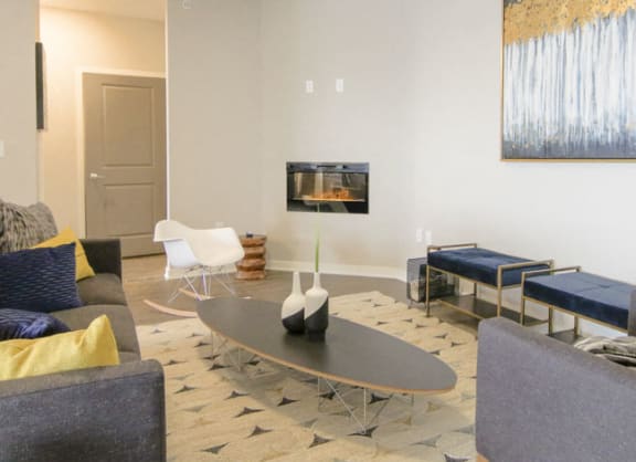 Living room with modern fireplace at WH Flats new luxury apartments in south Lincoln NE 68516
