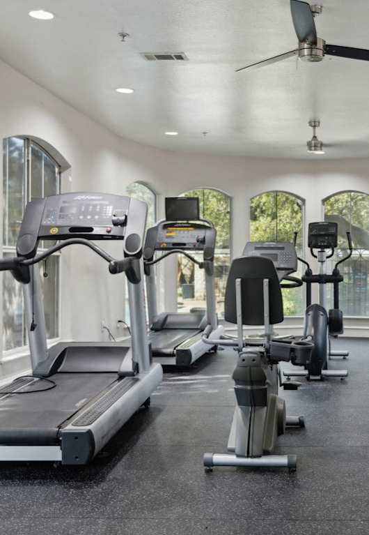 a row of weights in a gym at Northland at the Arboretum, Austin, 78759