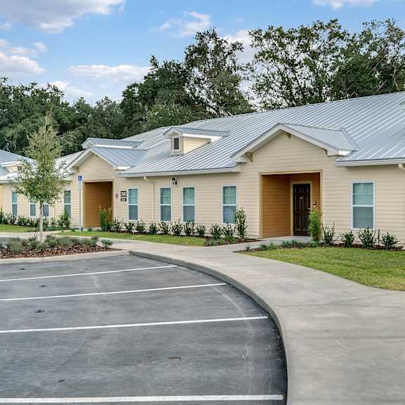 A promotional image for a New Year celebration in a new home with a waived admin fee on select 2 and 3 bedroom apartment homes.