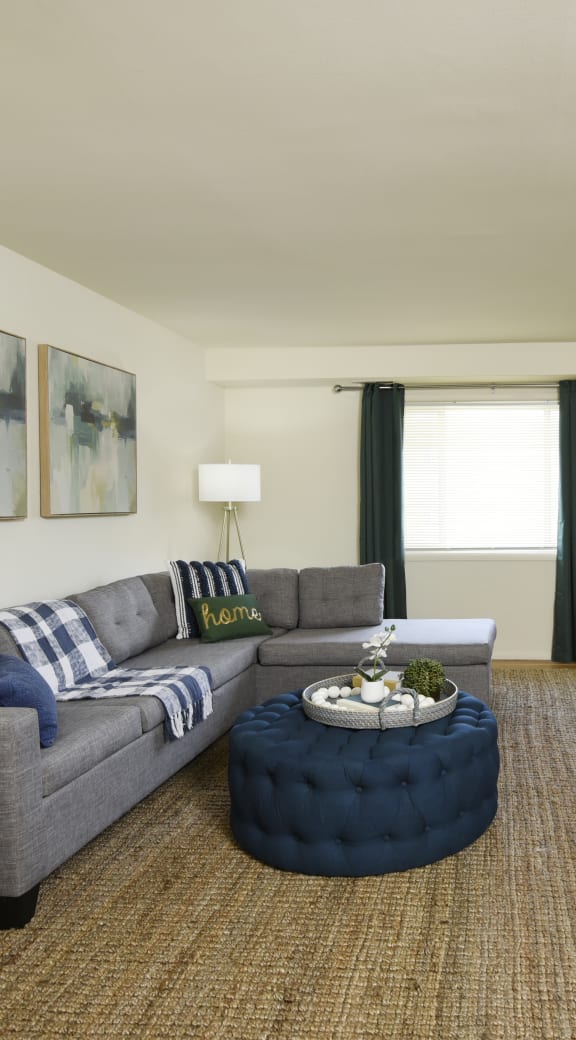 this is a photo of the living room of a 560 square foot, 1 bedroom apartment at Arbuta Arms Apartments*, Baltimore, 21230