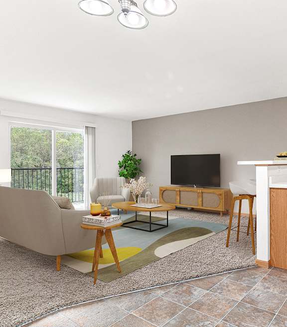 A living room with a grey sofa, a wooden cabinet, a TV, and a painting on the wall.