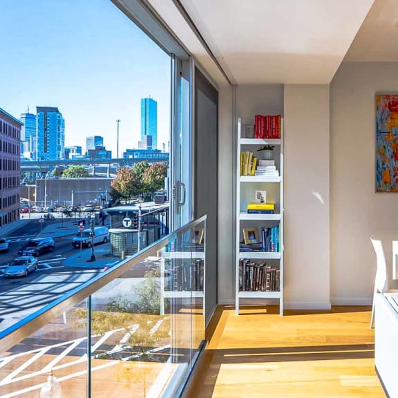 a living room with a view of the city