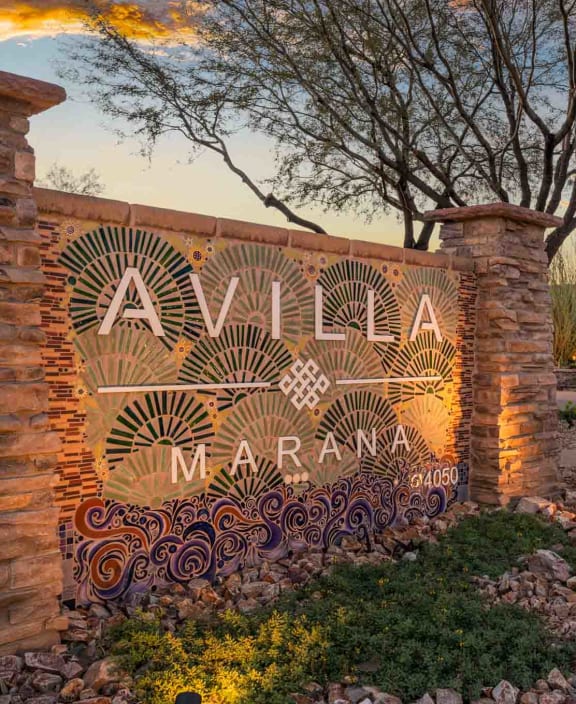 the sign for valley preserve in front of a sunset