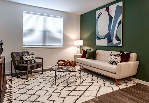 Spacious apartment living room interior at Brandywine Green featuring luxury finishes and natural light