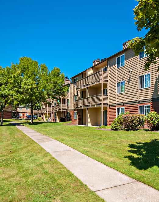 Hunt Club Apartments building exterior and walking path