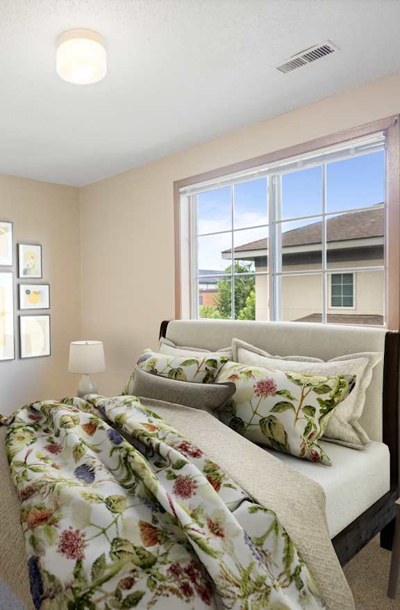 Bedroom with window at Ames Lake Neighborhood Apartments, St Paul, MN, 55106