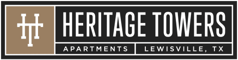 a black and white logo for heritage towers apartments