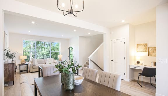 a living room with a couch and two tables at Foxtail Hollow, Blaine