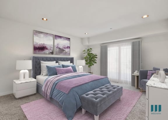 a bedroom with a bed and a sliding glass door to a balcony