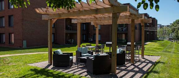 outdoor patio with pergola and lounge furniture
