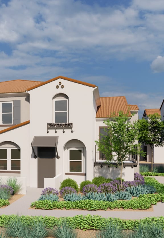 a rendering of a large home with a garden in the foreground