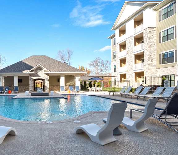 the preserve at ballantyne commons pool with chairs and apartment buildings at Aventura at Wild Horse Creek, Chesterfield, 63017