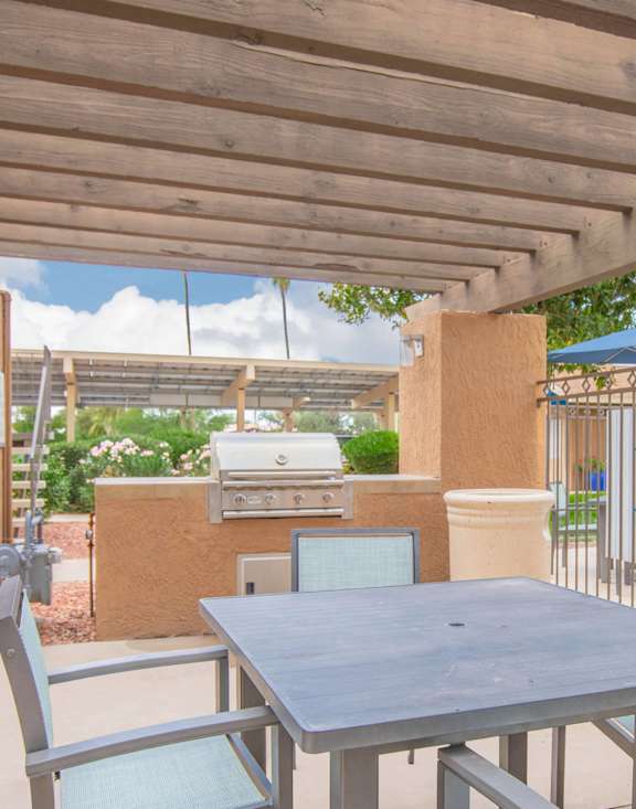 Capistrano Apartments BBQ Area with Table and Chairs