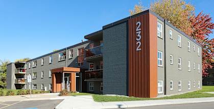 A modern building with the number 232 on its side.