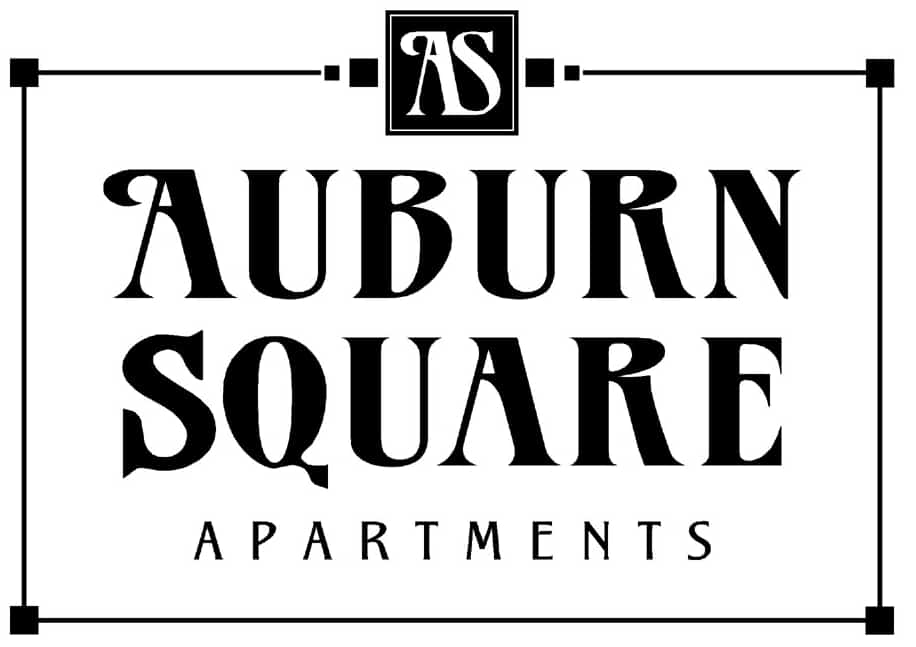 A black and white image of a logo for Auburn Square Apartments.