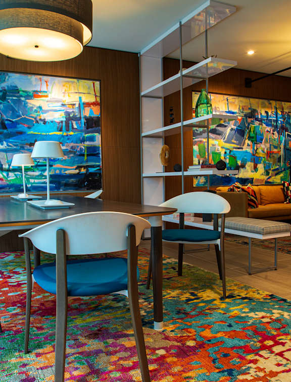 A dining room with a table and chairs at Artline Apartments, Washington, DC, 20024