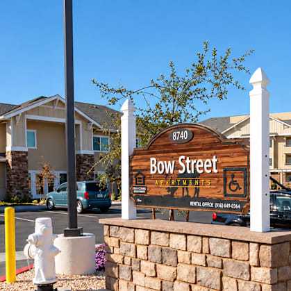 Bow Street is a place with a street sign and flowers.